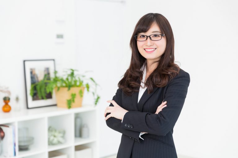 businesswoman with her arms crossed