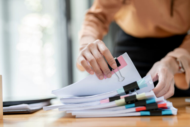working student fixing papers