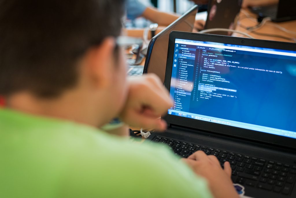 a man studying cybersecurity