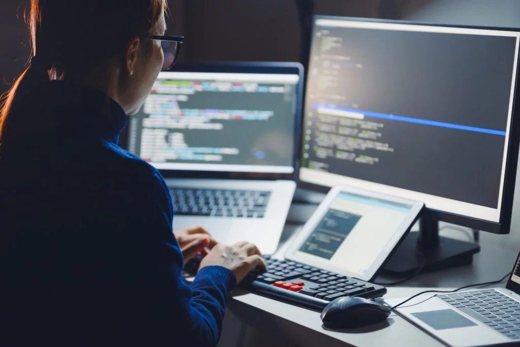 an it postgrad student using her computer