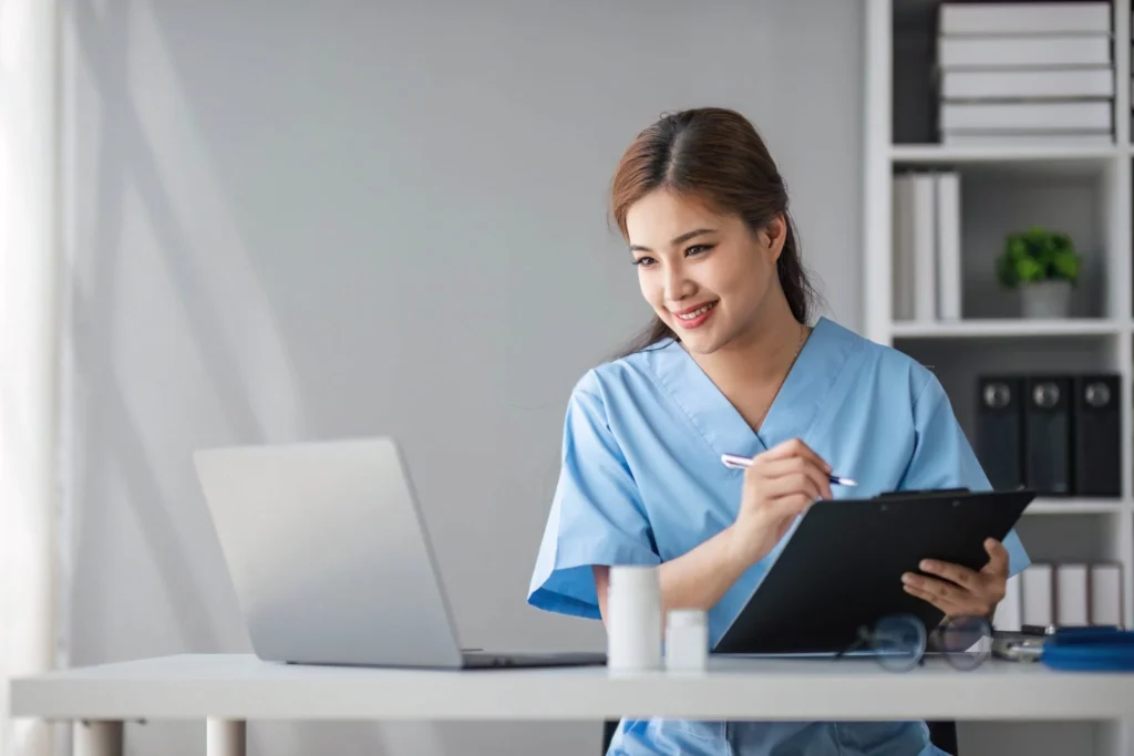 nurse holding a chart