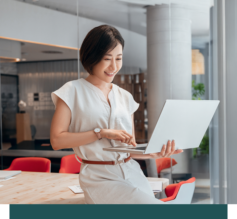 woman holding a laptop