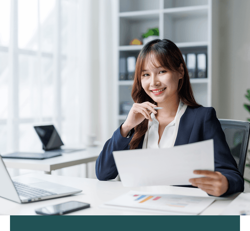 teacher holding paper