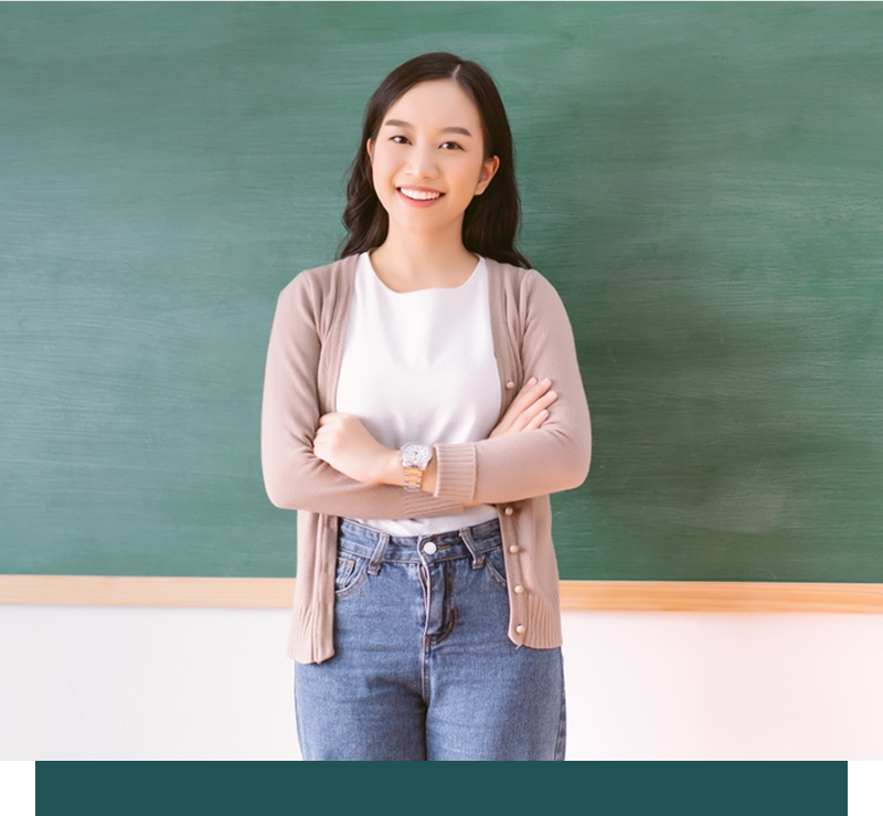 teacher in front of a blackboard