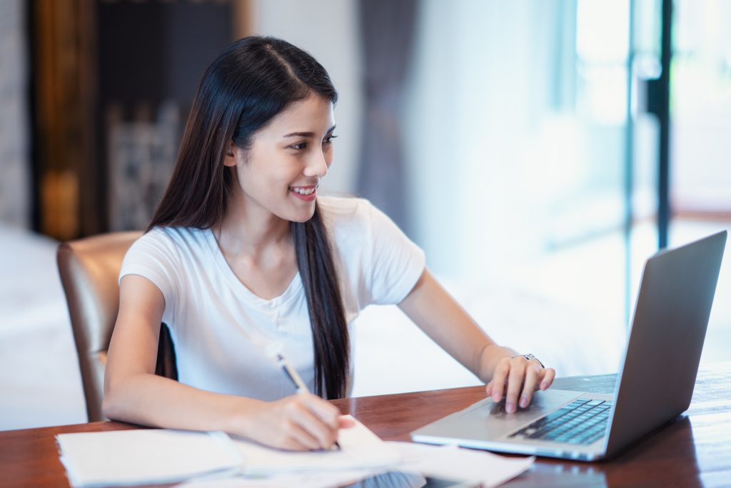 a woman attending an online class