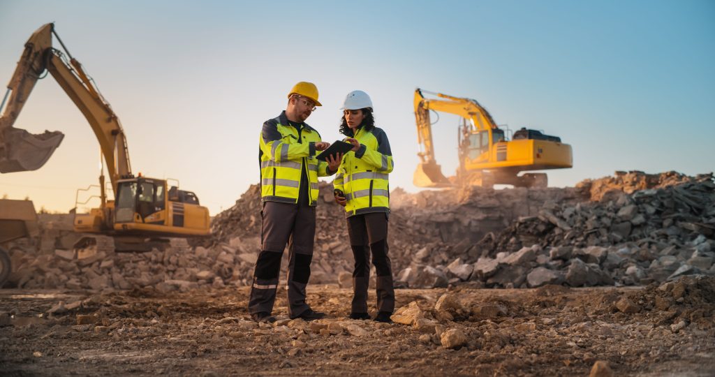 two engineers in a site talking